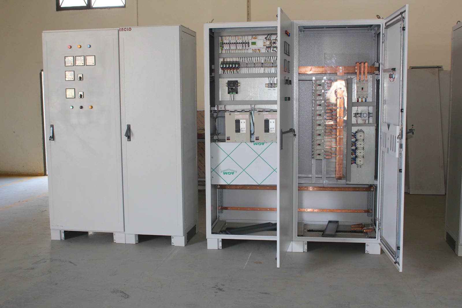 Open low-voltage panel showing busbars and mounted components
